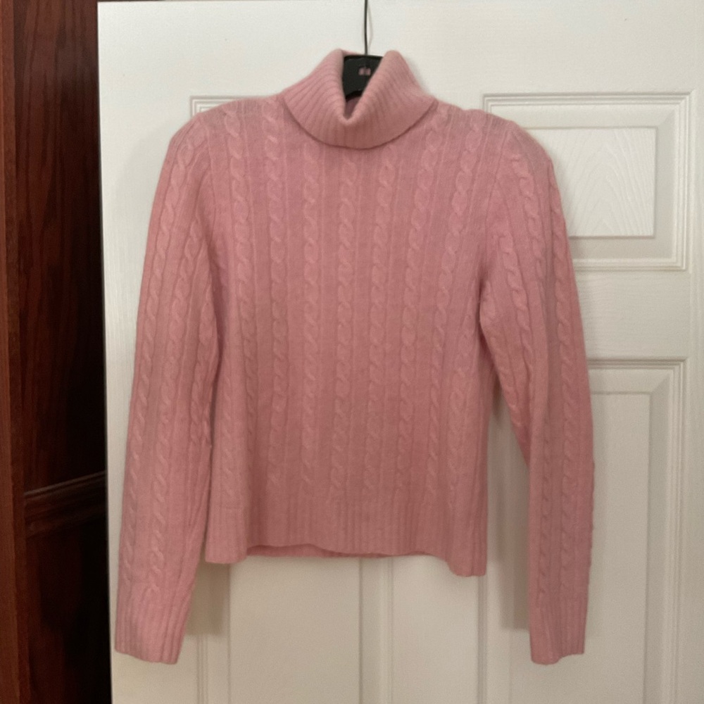 J. Crew pink turtleneck sweater.